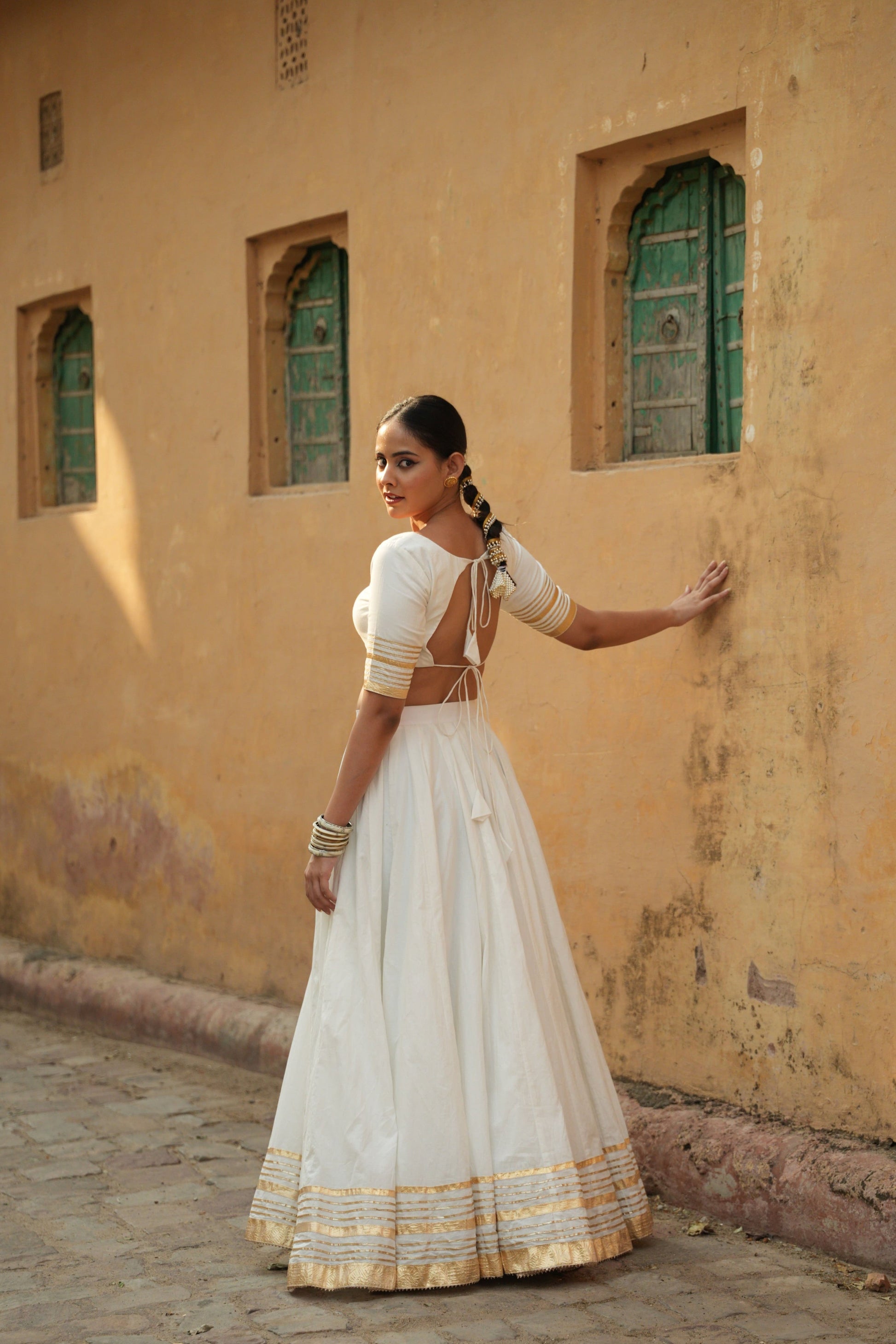 Designer white cotton lehenga.