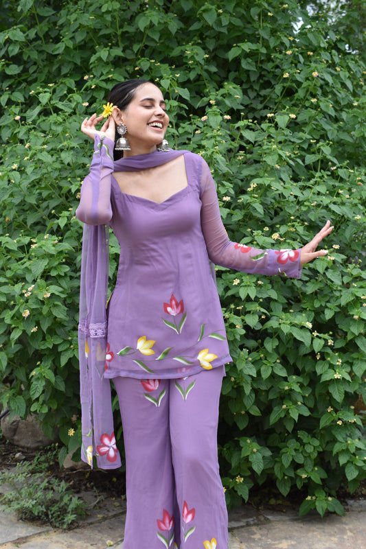 Lavender floral georgette kurta set with dupatta - sweetheart neckline and flared pants.