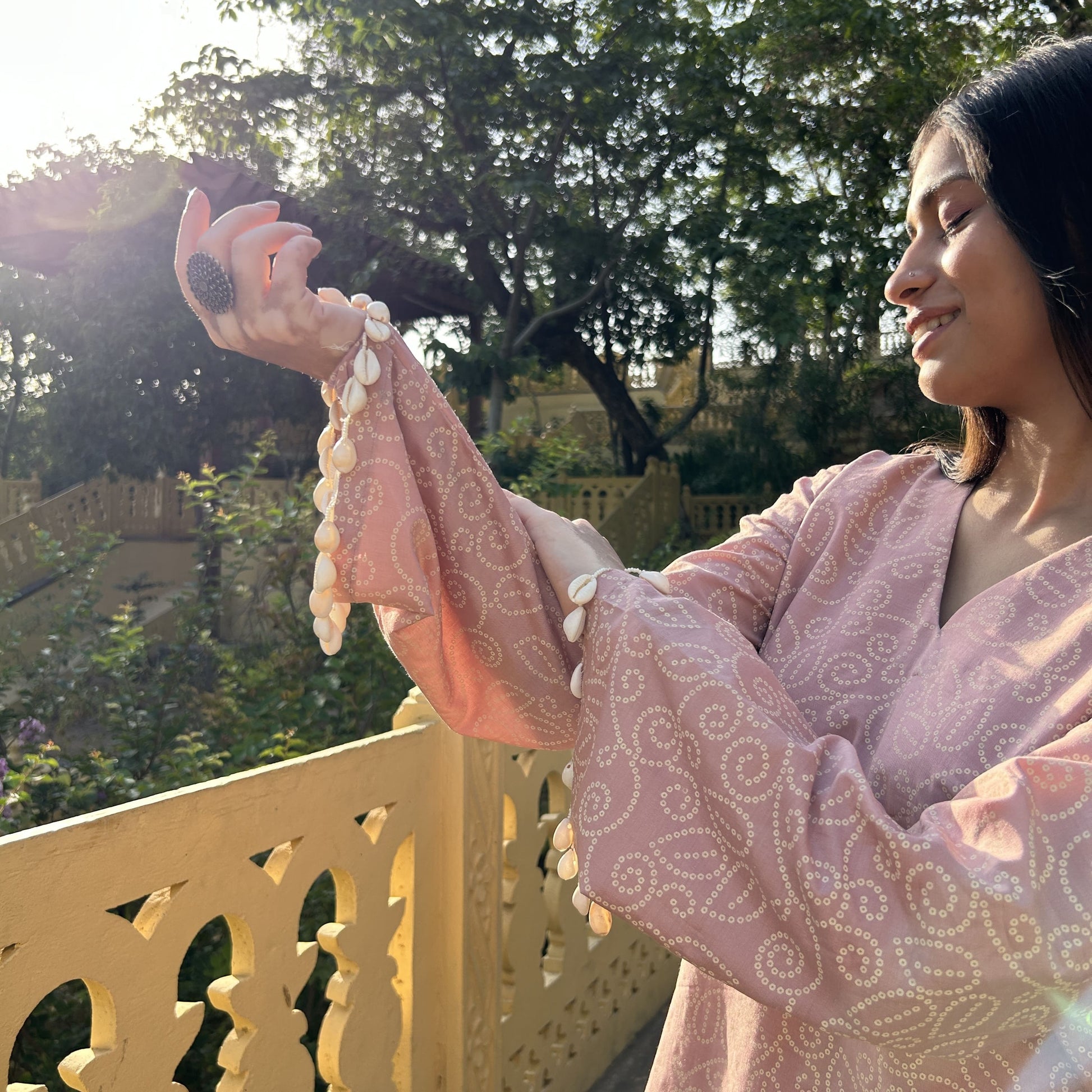 Light festive wear – soft pink kurta with straight off-white parallel trousers