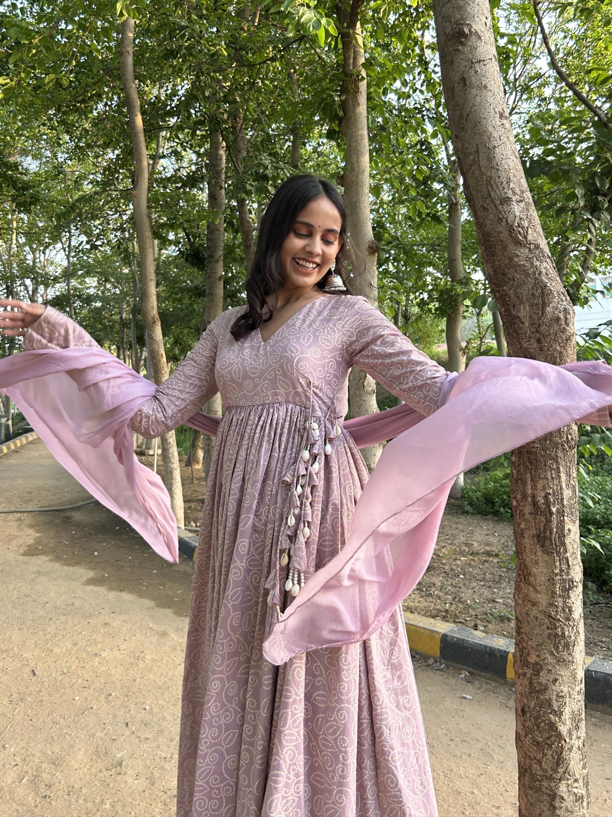 Pastel lavender angrakha flared suit with tassel and shell detailing