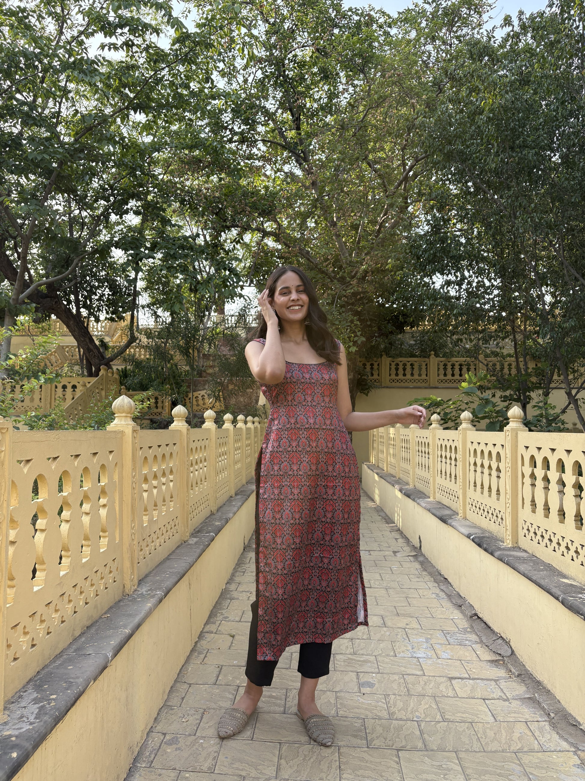 Straight fit black printed muslin silk kurta.